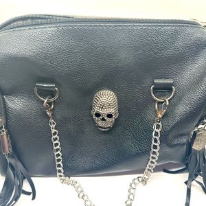 Skull bag studded. Black leather